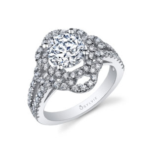 A unique floral theme halo diamond engagement ring
