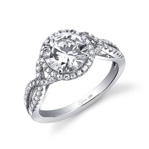 Criss-Cross Shank Diamond Engagement Ring Halo style diamond engagement ring with a twisted shank crossing over itself